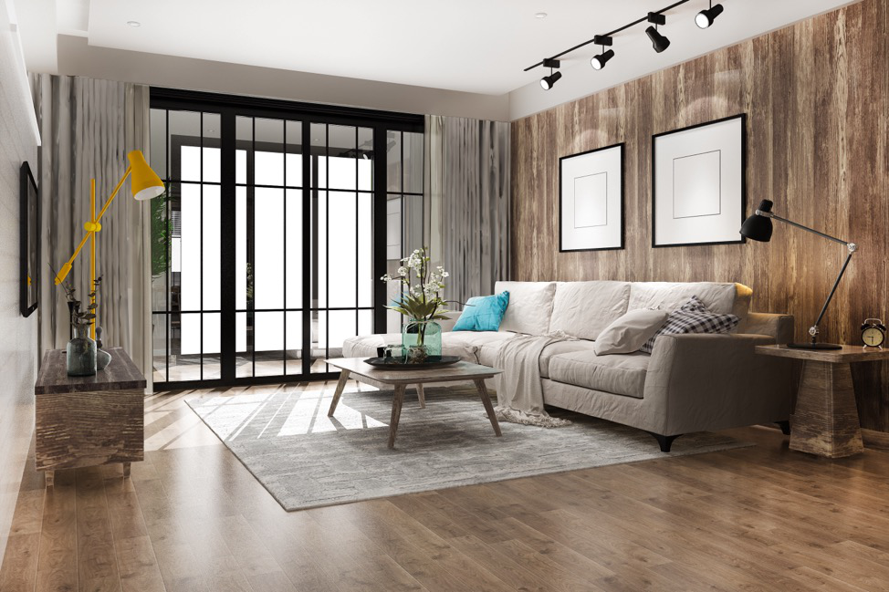 Tampa Flooring | Why Laminate Flooring Is a Smart Choice for Busy Households A spacious open-concept living area featuring dark laminate wood flooring