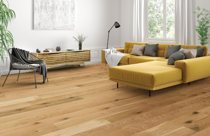 An elegant lounge with hardwood flooring, showcasing natural wood texture and a polished finish.