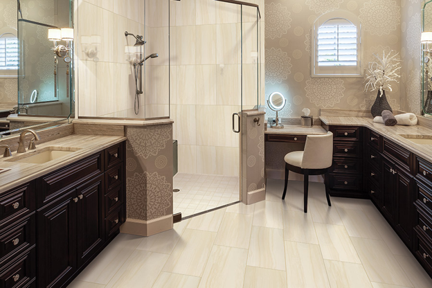 Tampa Flooring | Nonslip Bathroom Flooring Options for Tampa Homes An elegant bathroom with light-toned, nonslip tile flooring, dark wood cabinetry, and a glass shower.